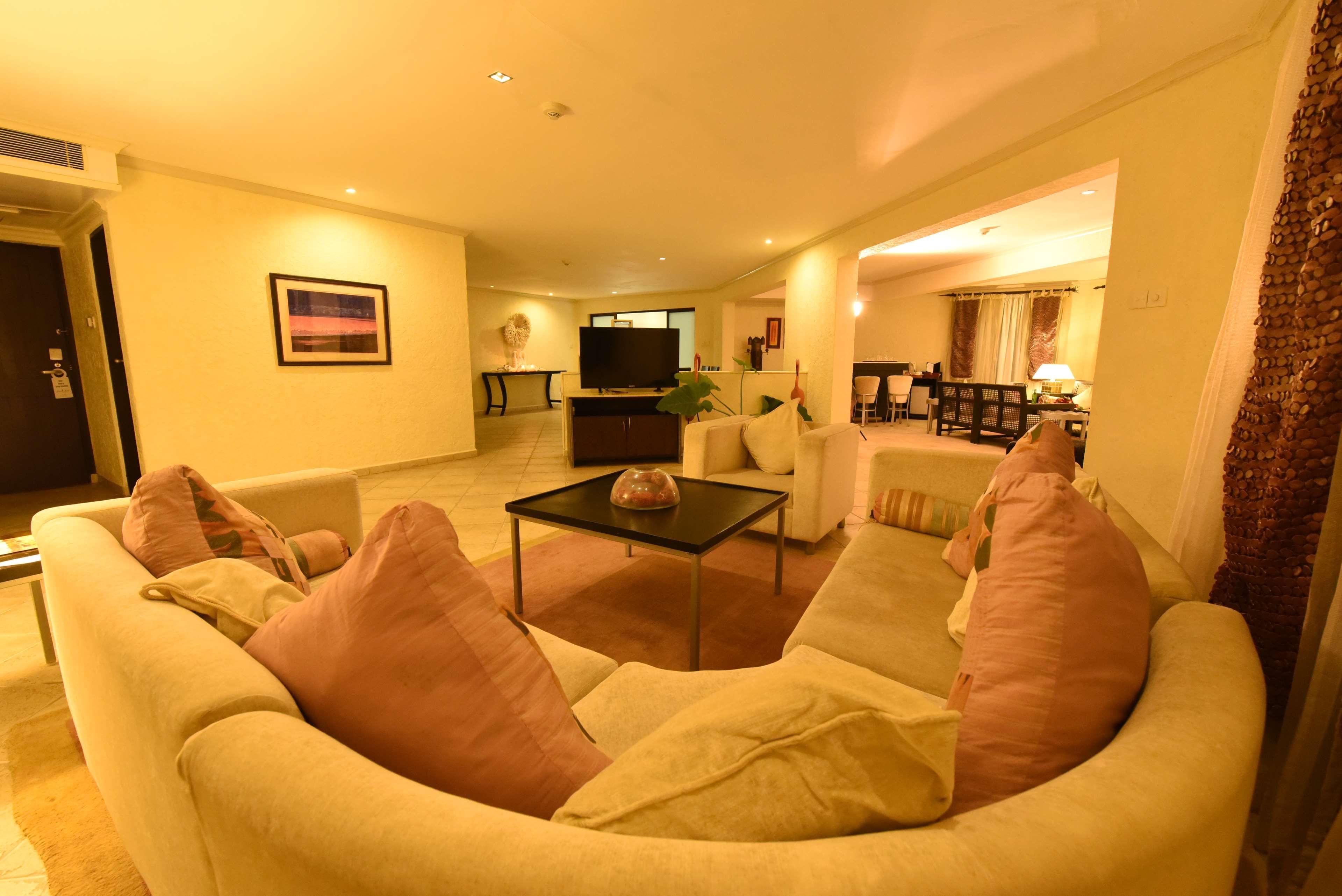Diani Reef Beach Resort & Spa - Your Beachfront Bliss Awaits Діані-Біч Екстер'єр фото A living room in a suite at the Ritz-Carlton, Maldives