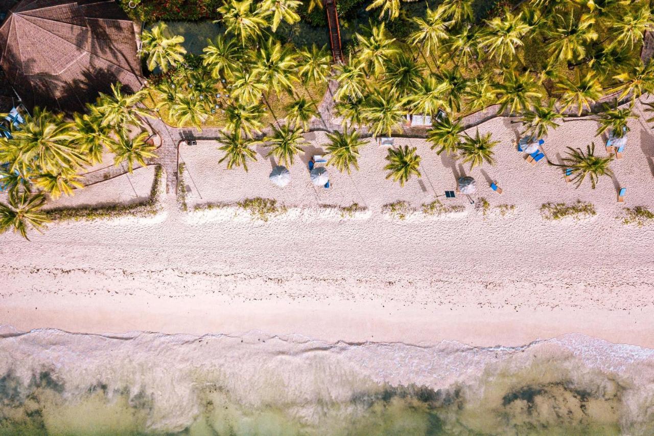 Diani Reef Beach Resort & Spa - Your Beachfront Bliss Awaits Діані-Біч Екстер'єр фото Beach at the resort