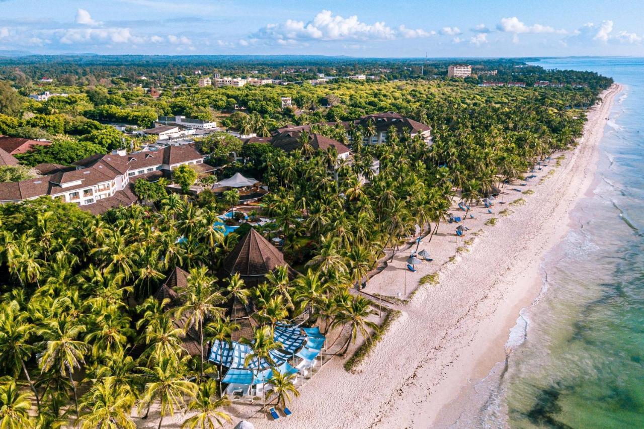 Diani Reef Beach Resort & Spa - Your Beachfront Bliss Awaits Діані-Біч Екстер'єр фото Aerial view of the resort