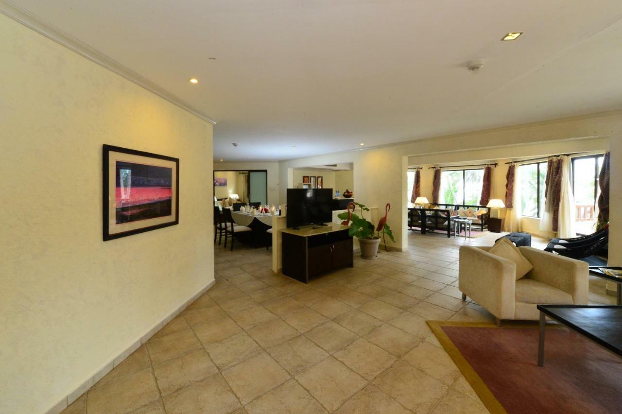 Diani Reef Beach Resort & Spa - Your Beachfront Bliss Awaits Діані-Біч Екстер'єр фото A typical suite at the hotel